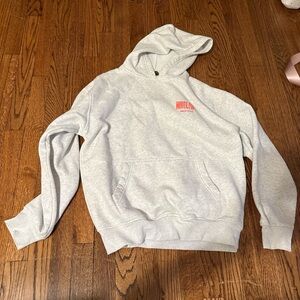 White fox Hoodie with orange Logo